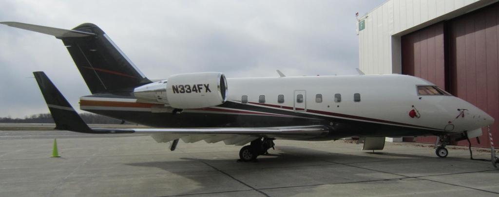 EXTERIOR EXTERIOR DESCRIPTION (Aircraft last painted in August 2016 by Flying Colours Corp., Peterborough, Ontario, Canada) Overall white top, with gold striping and overall grey bottom.