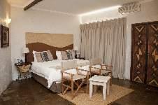 ACCOMMODATION Mountain Lodge: The luxury accommodation and executive suites are set in the perfectly manicured gardens, offering splendid views of the far-off hills.