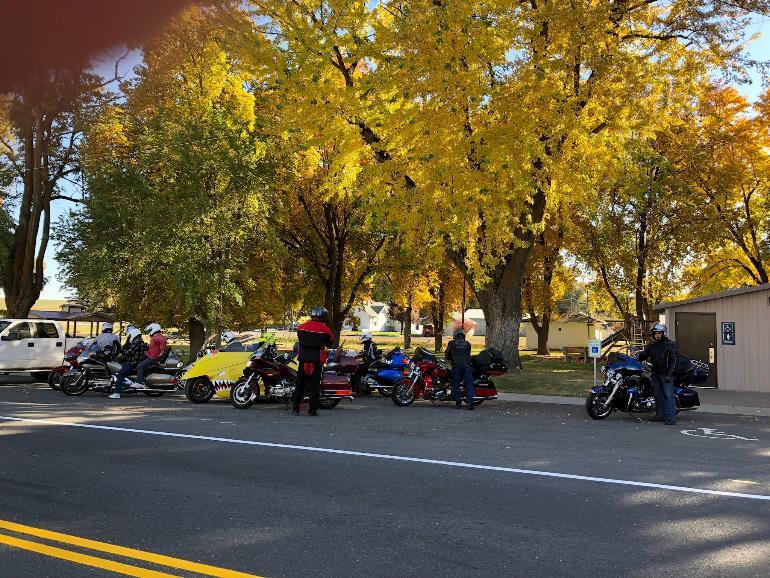 , Lyle and Alice Polack led 11 people riding 8 motorcycles (two and threewheels) on a cruise through the hills and valleys southwest of Reardon to Harrington for a stretch break and rest stop, then