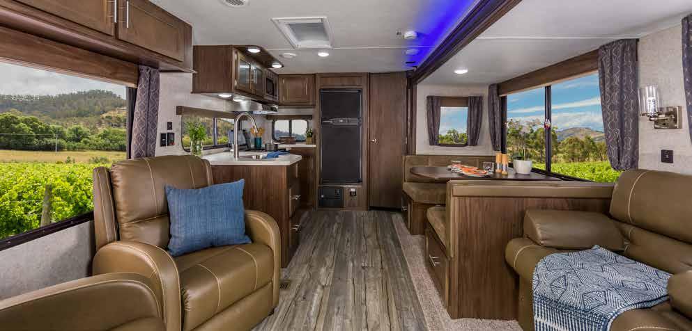 TRAVEL TRAILERS : DESTINATION TRAILERS : FIFTH WHEELS SHOWN IN NATURAL 274RK The 274 RK features a super slide with a full length sofa with lighted cup holders along with dual oversized recliners.