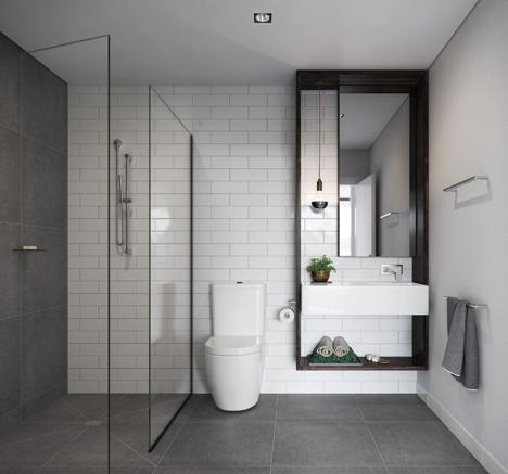 THE ESSENCE OF DESIRE Contemporary designed bathrooms with semi-frameless shower screens and large format tiling encapsulates pure