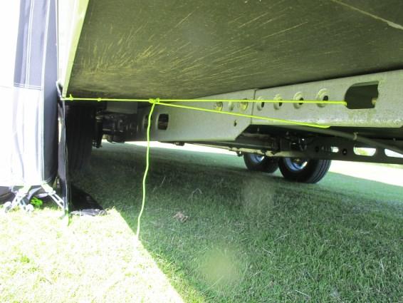 Using the rear pegging points, these bumpers should be pulled towards the motorhome. An improved seal can be maintained by use of the optional rear upright pole set.