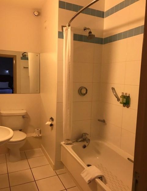 In partly accessible bathrooms the shower is above the bath. The height of the WC from floor to seat is 17.5".