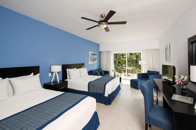 Rooms The Ocean Blue & Sand rooms are equipped with all the amenities you might need for a comfortable stay: - Flat-screen TV with international channels - Complimentary minibar restocked daily with