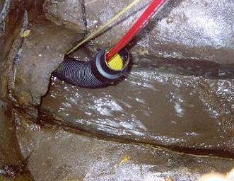 A typical guide that can avoid contact between the hose and any sharp edges in the sewer.