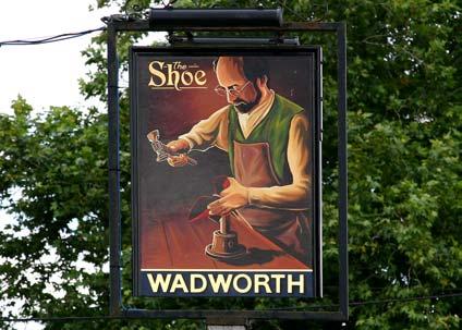 Shoe pub sign at