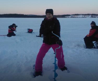spruceforest and Luostofell around the lake Ahvenlampi are with you during this icefishingtour near your hotel or cabin in Luostoarea.