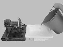contents of the Water Pan (D) Remove the pump Suction Screen and clean the Water Pump of all debris (E) Fill the Water