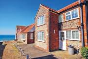 Stunning sea views, this traditional flint and brick house makes a wonderful base located on