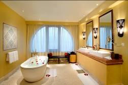 Deluxe Suite Decorated with rich natural fabrics and colours that draw inspiration from the