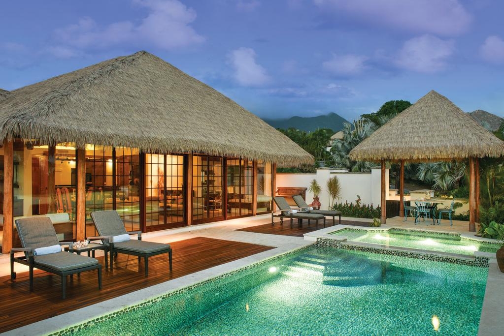 Paradise Beach Villas Inspired by the beauty of the Caribbean, each villa naturally blends into their tropical setting and onto the private beach.
