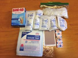 Sprains and Strains Instant Cold Pack 2 each. Triangular Bandage 1 each. Elastic Wraps 2 each.