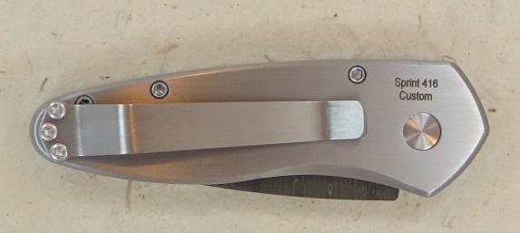 side is solid steel with clip, stainless Nichols Damascus Blade. $475 each dealer cost 8 available.