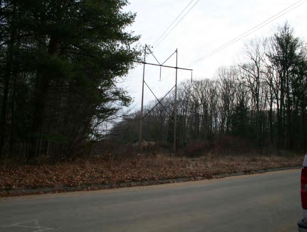Photo 5: View east of transmission line from Stafford Road in Mansfield, Connecticut.