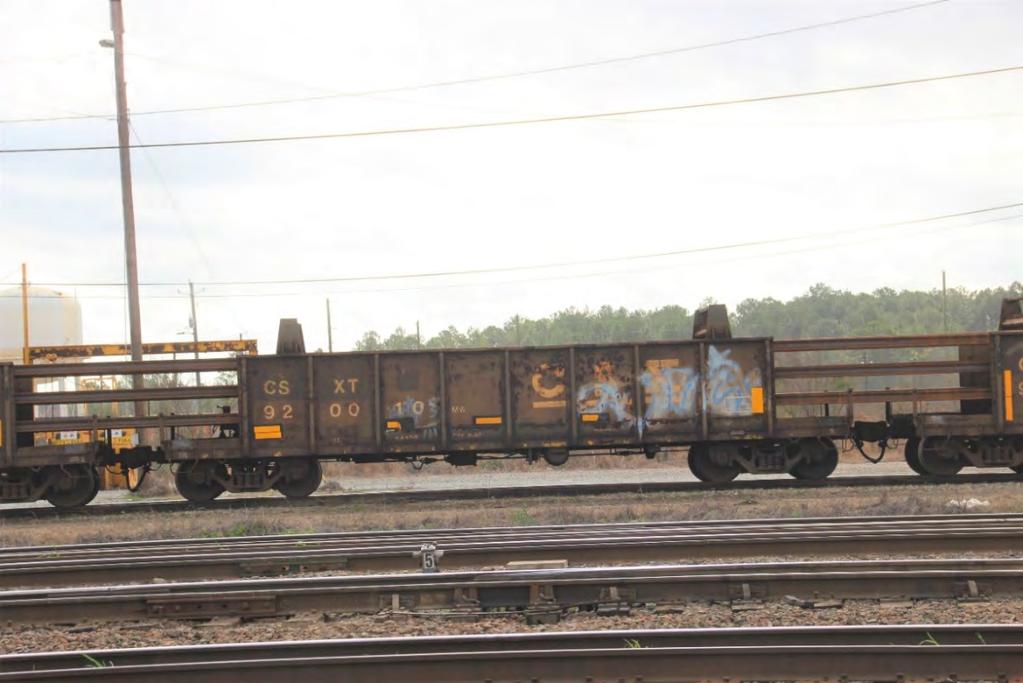 Seen here is CSXT 6491, a GP40-2, and CSXT 2320, a Road Slug, bringing the ribbon rail train