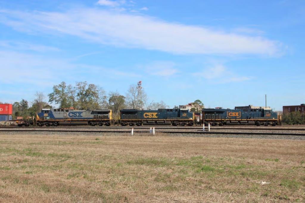 Leading a stack train south are CSXT 570, a CW44AC/H; CSXT