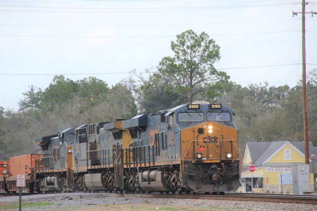 CSXT 3150, an ES44AH; CSXT 442, a CW44AC/H; and CSXT 92, a CW44AC/H, are seen