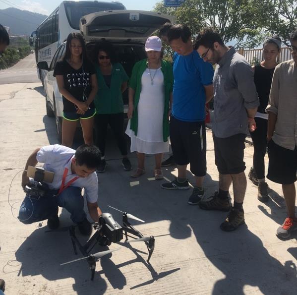 As students explored the town, they fortuitously ran into a local man who was using a drone to take aerial pictures of the town for the purposes of city planning a method that students had the