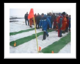 Members from each group will have to carry the giant tube or plastic sledge up the top of the hill.