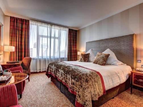 THE OPEN @ THE EUROPA HOTEL 3-4-5 Nights at the 4-Star Europa Hotel central Belfast * Selected days at The 148 th Open 3 NIGHT JUNIOR SUITE PACKAGE In 19 Out 22 July Saturday & Sunday at the 148 th