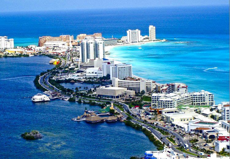 CANCUN, QUINTANA ROO, MEXICO 14 miles of sand white beaches shaped like a number "7, crystalline waters and nights full of eternal fun.