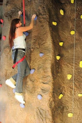 Build Confidence at New Heights with Rock Climbing. It s a good feeling to know that you can tackle a risky new feat with reliable teammates looking out for you.