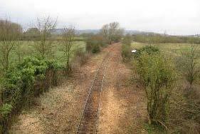 In the summer, low lying vegetation including grasses and ruderals currently covers the railway line. In the winter the railway line is more exposed and visible.