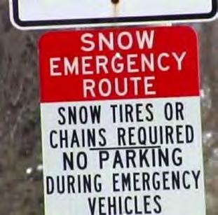 If a road has the Snow Emergency Route sign, it means that after two or more inches of snow has fallen, or a snow emergency has been declared, no vehicles should be parked on the paved roadway of the