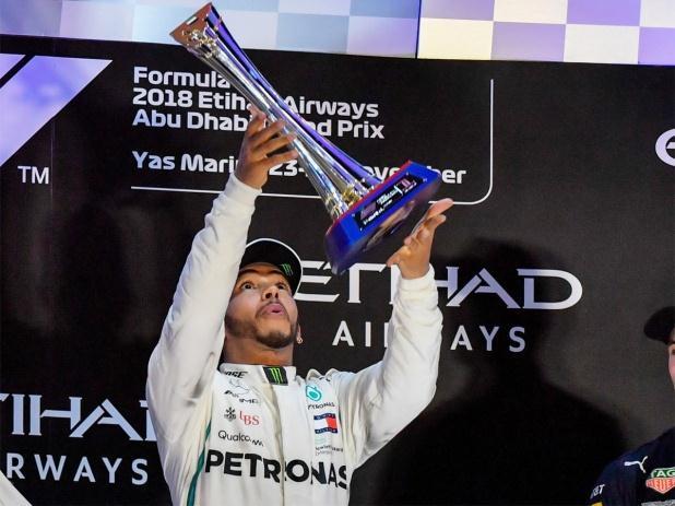 Britain, Mercedes) wins Abu Dhabi Grand Prix, the season s 21 st and last Formula one event This was the 11 th win of this year for the champion driver, edging out Sebstian Vettel of Ferrari and Max