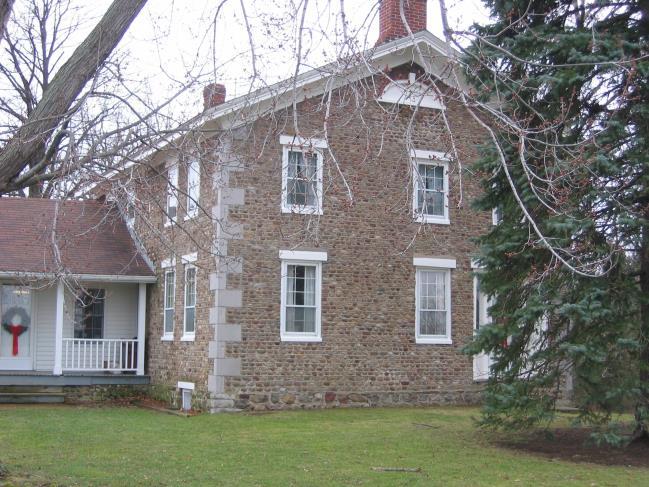 narrow to twenty-four inches at the top. 5 The two-story five bay cobblestone house at 1229 Birdsey Road, town of Junius, was built in the 1830s or 1840s of Federal style.