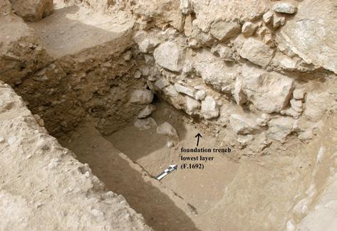 The building technique of Cyclopean Wall W.4 (Fig. 2) included a foundation trench (P.1677), 0.8 m wide, filled progressively for laying superimposed courses of big limestone boulders.