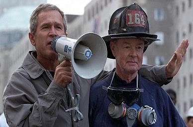 After a few hours after the towers collapsed, President George W. Bush was flown to NYC from a school in Florida. Standing at ground zero, he was handed a bullhorn.