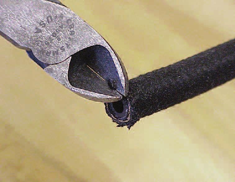 1 Cut the necessary length of hose material squarely with a cutoff saw or fine-tooth hacksaw.