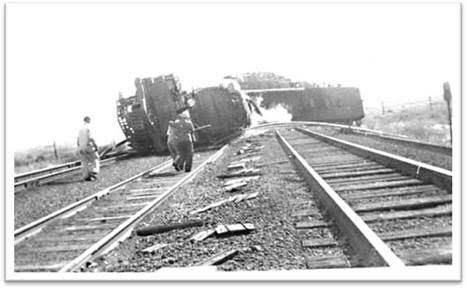 Brakeman Anderton s left leg was twisted and pinned between a wooden seat and the steel side of the cab.