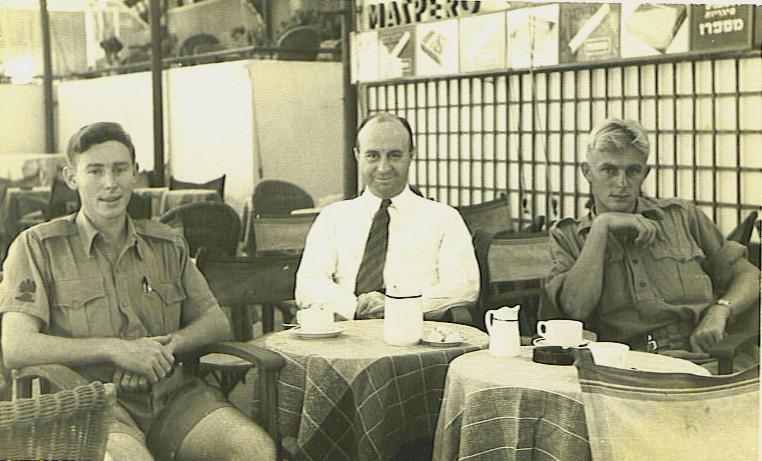 Coffee in a Tel Aviv café (1941) L-to-R WOI Campbell Hartmann, Dr Phillip Joseph (Palestinian Government Official) and 19 year old Gunner Ron Hartmann Returning to civilian life, Ron worked as a