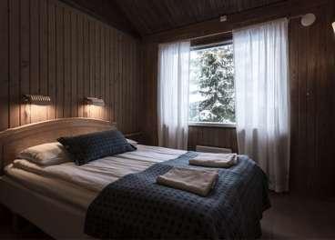 Arctic Chalets - have a rustic character, with pine wood paneled walls, tiled floors and birchwood