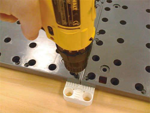 Standard elements Levelling foot The levelling foot fits into all of the basic elements to provide easy levelling capabilities from the top side with a screwdriver.