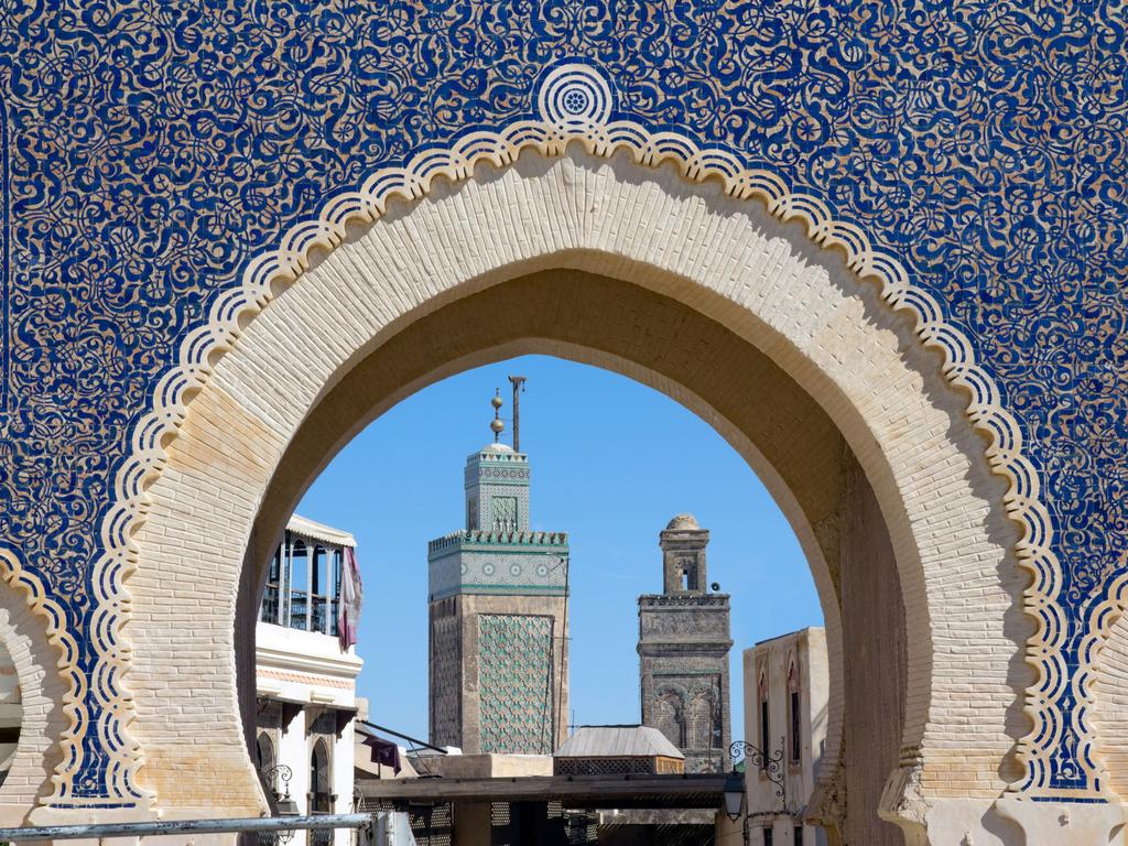 After lunch, return to Fes to visit the royal palace built in the late 19th-century as a summer residence for the King Hassan; inside see the central four-part garden and the Museum of Fez