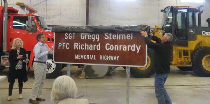 District Six Sign honors veterans: KDOT, Kansas Sen. John Doll and the Dodge City Area Chamber of Commerce hosted a ceremony on April 21 to designate a six-mile section of U.S. 50 east of Dodge City as the Sgt.