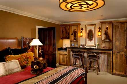 SHOSHONE SUITE Two-room suite: Native American motif, handcrafted beds, handcrafted wet bar and original paintings.