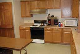 Full Kitchen Available The spacious kitchen features ample countertops and a close proximity to all of the rooms.