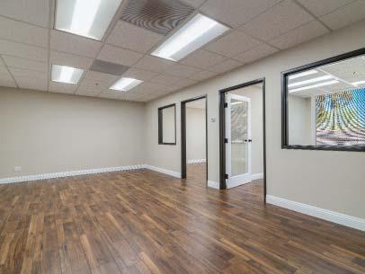 conference room, kitchenette, and open office area.