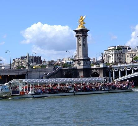 Afterwards, board a glass-topped Bateau Mouche and enjoy a refreshing cruise on the Seine River. Continue on to the highest point in Paris, Montmartre, known locally as La Butte.