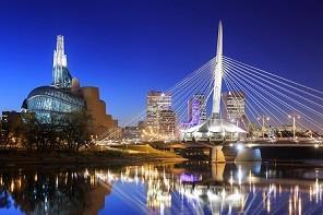 Winnipeg is the capital and largest city of the province of Manitoba in Canada. It is near the longitudinal center of North America and is 70 miles from the Canada United States border.