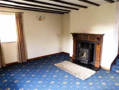 This delightful cottage offers entrance hall, kitchen with dining area, sitting room, inner hall, dining room/bedroom with french doors to garden, utility room