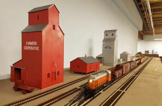 by Bob Hanmer The Ericksen s Milwaukee Road article and photos by Walt Herrick Another excellent (and large!) Fox Valley Division model railroad is being built in Gordy and Gail Ericksen s basement.