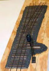 A nicely scratch built, and finely detailed East Broad Top water spout sits next to David s section of track. Leif Hansen s signaled section of HO track placed Third in the contest (below middle).