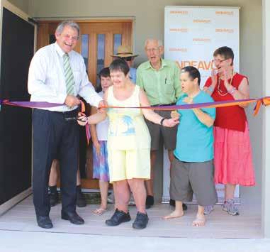 At home: Among the people at the opening ceremony for the Cairns houses were (from left) Endeavour Foundation CEO David Barbagallo, Shirley Summers, Robyn Klimek, Robyn Johnstone, Bernard Booker,