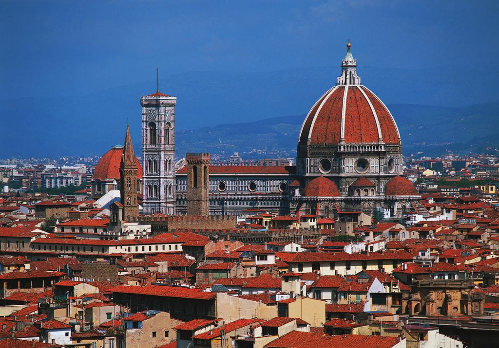 The Baptistery (l) and Duomo (r) rise above Florence s rooftops.