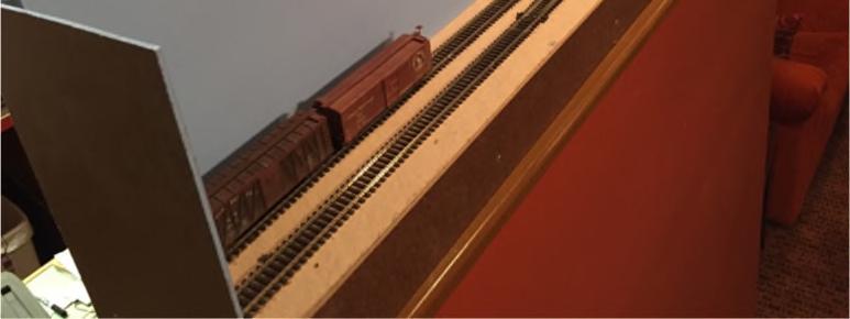 Features include: A hidden staging track Two industrial sidings that would hold 3 cars plus engine Two industrial sidings that would hold 2 cars plus engine Two Peco #5 left hand switches One Peco #5